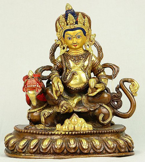 Jambhala on Dragon - gold-plated statue.