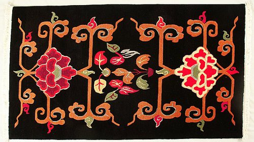 Tibetan carpet with Lotus design.