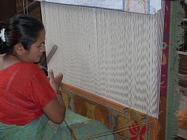 Weaver Working on Traditional Design