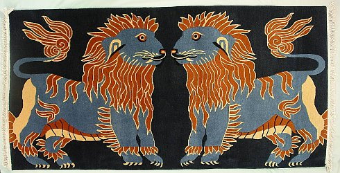 Two Snow Lions Facing Each Other.