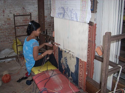 Tibetan rug on the loom II.